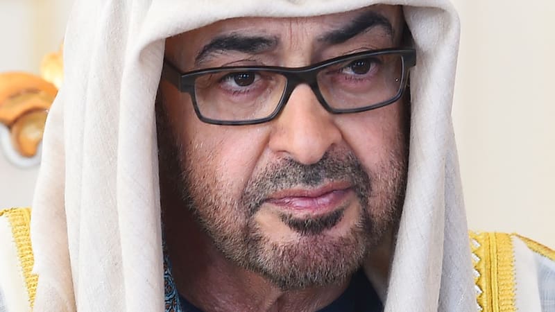 Close-up portrait of UAE President Sheikh Mohamed bin Zayed Al Nahyan in a white headdress and glasses