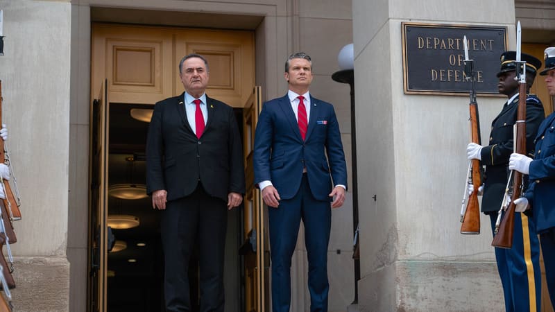 Israel's Defense Minister Israel Katz stands beside US Defense Secretary Pete Hegseth on the Pentagon steps
