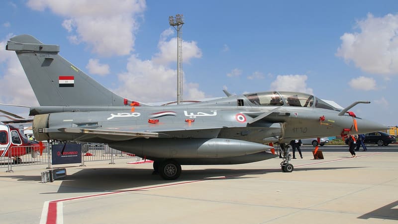 Grey two-seat Egyptian Air Force Rafale fighter with Egyptian markings, parked on an airshow apron