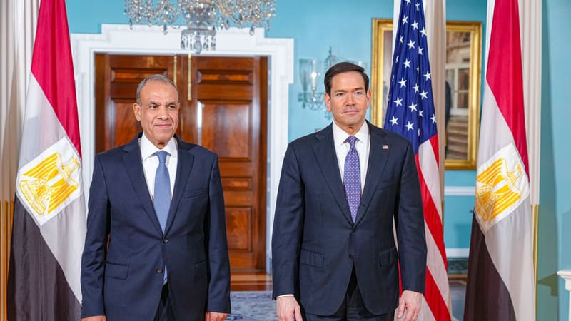 Badr Abdelatty and Marco Rubio stand side by side at the State Department, flanked by Egyptian flags and a US flag