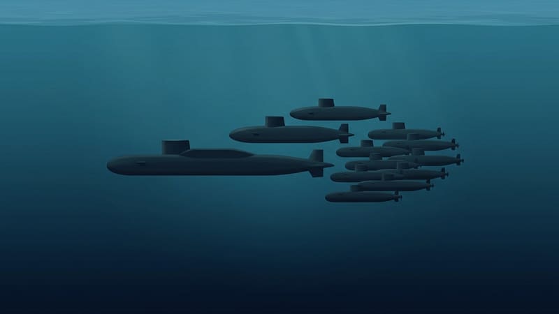 Illustration of submarine silhouettes underwater: one long missile submarine leads two medium boats and many smaller ones