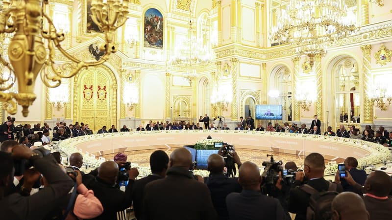 Delegations seated around a large round table in a gilded Kremlin hall during the Russia-Africa Summit
