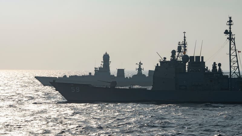Indian Navy destroyer INS Chennai sailing behind the U.S. cruiser USS Princeton in the North Arabian Sea