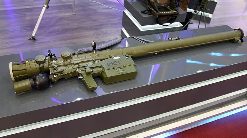 Display model of a 9K333 Verba shoulder-fired missile launcher lying on an exhibition stand