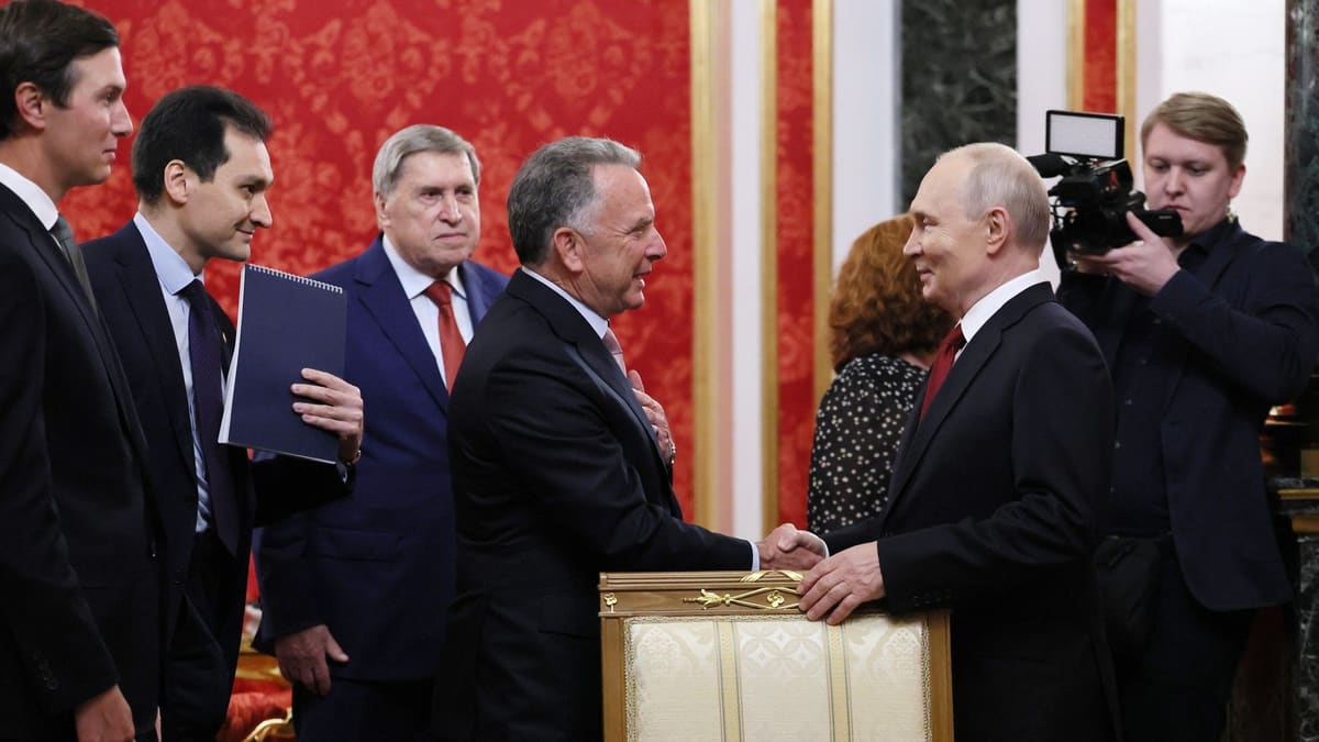 Putin shakes hands with Steve Witkoff in a red Kremlin hall as Jared Kushner, Kirill Dmitriev and Yury Ushakov look on