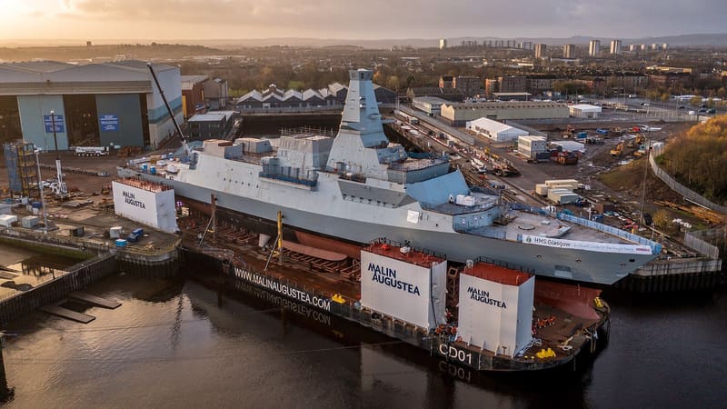 Type 26 frigate HMS Glasgow on a launch barge beside the BAE Systems Govan shipyard in Glasgow
