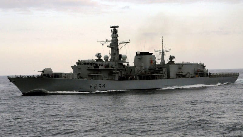 Type 23 frigate HMS Iron Duke, pennant F234, underway at sea under an overcast evening sky