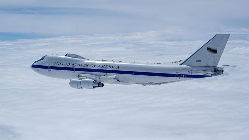 U.S. Air Force E-4B Nightwatch doomsday plane flying above a layer of clouds